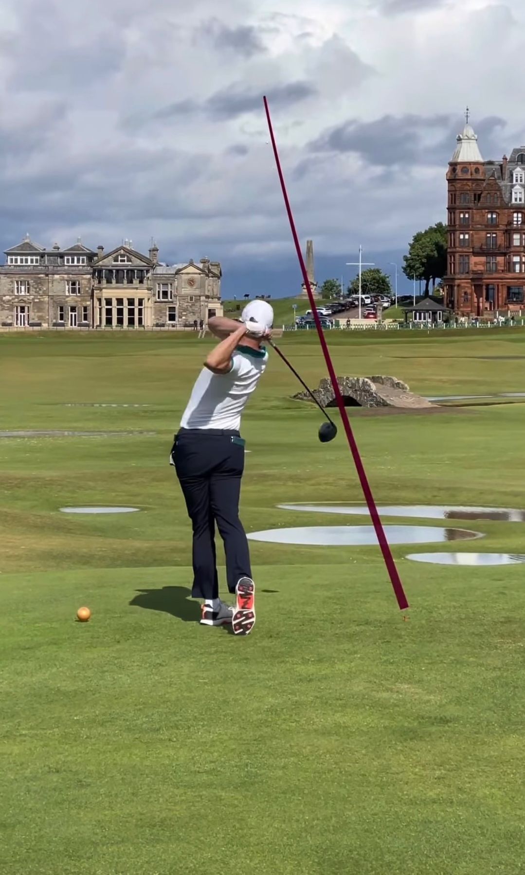 Driving off the first tee of the Old Course at St Andrews